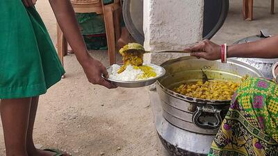 A student being served mid-day meal at a school (PTI File/Representative Image) A student being served mid-day meal at a school (PTI File/Representative Image)