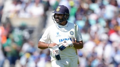 India's Rohit Sharma looks up at the large screen as he walk off the pitch after being given out lbw off the bowling of Australia's Pat Cummins on the second day of the ICC World Test Championship Final between India and Australia at The Oval cricket ground in London, Thursday, June 8, 2023.AP/PTI(AP06_08_2023_000247A) (AP) India's Rohit Sharma looks up at the large screen as he walk off the pitch after being given out lbw off the bowling of Australia's Pat Cummins on the second day of the ICC World Test Championship Final between India and Australia at The Oval cricket ground in London, Thursday, June 8, 2023.AP/PTI(AP06_08_2023_000247A) (AP)