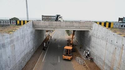 Workers seen repairing the damaged Delhi-Mumbai Expressway underpass and flyover of the Mahun village in Nuh District, Mewat, in Gurugram. (Photo by Parveen Kumar/Hindustan Times) Workers seen repairing the damaged Delhi-Mumbai Expressway underpass and flyover of the Mahun village in Nuh District, Mewat, in Gurugram. (Photo by Parveen Kumar/Hindustan Times)