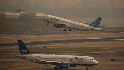 A JetBlue plane departs LaGuardia Airport (LGA) in the Queens borough of New York, US, on Thursday, June 8, 2023. The Federal Aviation Administration said LaGuardia Airport flights have now been placed under a ground delay program after being grounded due to poor visibility. Photographer: Michael Nagle/Bloomberg (Bloomberg) A JetBlue plane departs LaGuardia Airport (LGA) in the Queens borough of New York, US, on Thursday, June 8, 2023. The Federal Aviation Administration said LaGuardia Airport flights have now been placed under a ground delay program after being grounded due to poor visibility. Photographer: Michael Nagle/Bloomberg (Bloomberg)