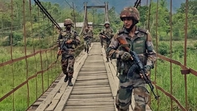 Security personnel conduct Joint Combing Operations in sensitive areas both the Hills and Valley sectors of Manipur on Thursday. (Pitamber Newar) Security personnel conduct Joint Combing Operations in sensitive areas both the Hills and Valley sectors of Manipur on Thursday. (Pitamber Newar)