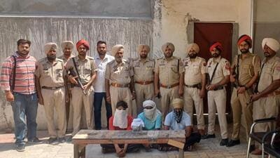 The Amritsar Rural police team with the three accused arrested on Friday for the killing of gangster Jarnail Singh at Sathiala village in Baba Bakala sub division on May 24. (HT Photo)