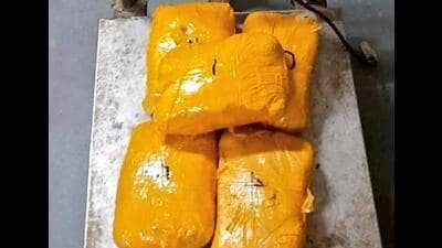 The five packets of heroin that were recovered from a consignment dropped by a Pakistani drone near Rai village in Amritsar district of Punjab on Friday. (HT Photo)