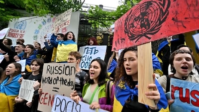 Ukrainian students hold placards denouncing an ecocide during their rally outside of United Nations (UN) office in Kyiv on June 8 on day after thousands fled their homes following the destruction of a Russian-held dam in Ukraine flooded dozens of villages and parts of a nearby city, sparking fears of a humanitarian disaster. (AFP) Ukrainian students hold placards denouncing an ecocide during their rally outside of United Nations (UN) office in Kyiv on June 8 on day after thousands fled their homes following the destruction of a Russian-held dam in Ukraine flooded dozens of villages and parts of a nearby city, sparking fears of a humanitarian disaster. (AFP)