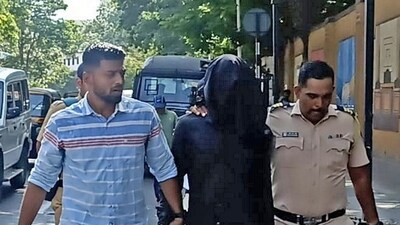 Accused Manoj Sane being bought to Thane sessions court in the killing of Saraswati Vaidya, in Thane on Thursday. (ANI) Accused Manoj Sane being bought to Thane sessions court in the killing of Saraswati Vaidya, in Thane on Thursday. (ANI)