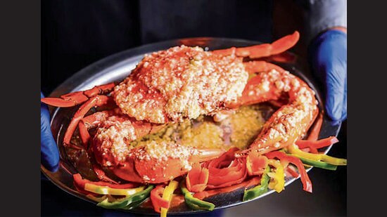 The butter-soaked crab served at Mumbai’s Trishna is on every visitor’s must-do list. It’s Mumbai’s answer to Delhi’s Bukhara. (Instagram/@trishnamumbai)