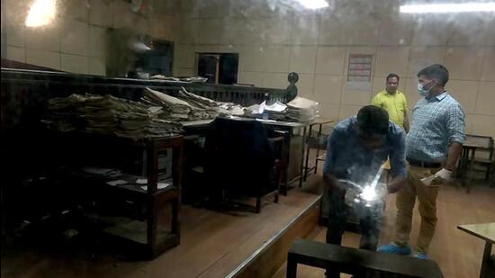 The crime scene in the Sanjeev Maheshwari murder case being examined . (FILE PHOTO)