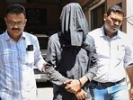 Manoj Sane, accused of killing his live-in partner Saraswati Vaidya, being escorted by the police outside the Mira Road Police Station, in Thane, on Friday, Manoj Sane, accused of killing his live-in partner Saraswati Vaidya, being escorted by the police outside the Mira Road Police Station, in Thane, on Friday,