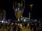 Fans in front of a replica Champions League trophy ahead of the final.