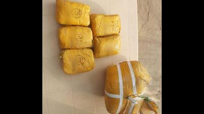 BSF teams recovered five packets of heroin wrapped with yellow colour adhesive from the Amritsar sector. (HT FIle)