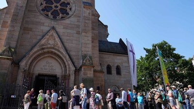 People queue for a church service in Nuremberg, Germany, Friday, Hundreds of German Protestants have attended a church service in Bavaria that was generated almost entirely by artificial intelligence. (AP) People queue for a church service in Nuremberg, Germany, Friday, Hundreds of German Protestants have attended a church service in Bavaria that was generated almost entirely by artificial intelligence. (AP)