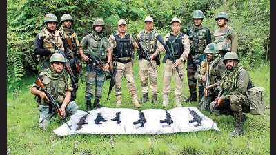 Indian Army soldiers recover 22 automated weapons in Manipur on Saturday. (ANI) Indian Army soldiers recover 22 automated weapons in Manipur on Saturday. (ANI)