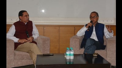 Neeraj Kumar (right) in conversation with Dr HK Bali at IT Park in Chandigarh on Friday. (Sant AroraHT)