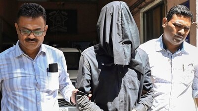 Manoj Sane, accused of killing his live-in partner Saraswati Vaidya, being escorted by the police outside the Mira Road Police Station, in Thane, on Friday, (PTI) Manoj Sane, accused of killing his live-in partner Saraswati Vaidya, being escorted by the police outside the Mira Road Police Station, in Thane, on Friday, (PTI)