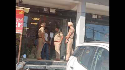 Police at the crime scene in Jhampur village, Mohali, on Friday. (HT Photo) Police at the crime scene in Jhampur village, Mohali, on Friday. (HT Photo)