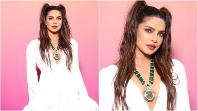 Priyanka's ensemble is from the shelves of the Italian fashion designer Giambattista Valli's eponymous label. The Haute Couture look features exaggerated sleeves embroidered in feather adornments and a floor-length silhouette. (Instagram) Priyanka's ensemble is from the shelves of the Italian fashion designer Giambattista Valli's eponymous label. The Haute Couture look features exaggerated sleeves embroidered in feather adornments and a floor-length silhouette. (Instagram)