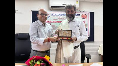 Prof Manoj Dixit (left) greets Prof Arun Diwakar Nath Bajpai at Lucknow University on June 10. (Sourced) Prof Manoj Dixit (left) greets Prof Arun Diwakar Nath Bajpai at Lucknow University on June 10. (Sourced)