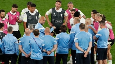 Manchester City manager Pep Guardiola with players during training ahead of UCL final (REUTERS)