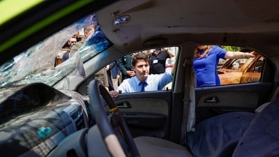 Canadian Prime Minister Justin Trudeau visits an exhibition of destroyed vehicles in Kyiv on June 10, 2023, amid Russia's invasion of Ukraine. (AFP)