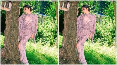In another striking ensemble,Mouni choose a pastel ensemble adorned with silver sequin details. The outfit featured dramatic full sleeves, a plunging cut-out neckline, and a thigh-high slit in the middle, creating a captivating and glamorous look. (Instagram/@imouniroy) In another striking ensemble,Mouni choose a pastel ensemble adorned with silver sequin details. The outfit featured dramatic full sleeves, a plunging cut-out neckline, and a thigh-high slit in the middle, creating a captivating and glamorous look. (Instagram/@imouniroy)