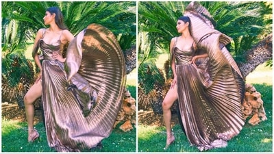 Mouni Roy pleasantly surprised her fans on Friday by sharing pictures on Instagram. She looked stunning in a gown from the popular fashion brand Fovari, styled by Maneka Harisinghani. (Instagram/@imouniroy) Mouni Roy pleasantly surprised her fans on Friday by sharing pictures on Instagram. She looked stunning in a gown from the popular fashion brand Fovari, styled by Maneka Harisinghani. (Instagram/@imouniroy)