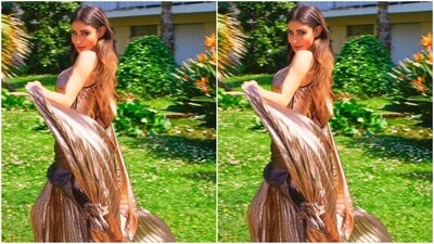 To complete her stunning look, Mouni Roy opted for middle-parted, long, flowing tresses that gracefully cascaded down her shoulders. (Instagram/@imouniroy) To complete her stunning look, Mouni Roy opted for middle-parted, long, flowing tresses that gracefully cascaded down her shoulders. (Instagram/@imouniroy)