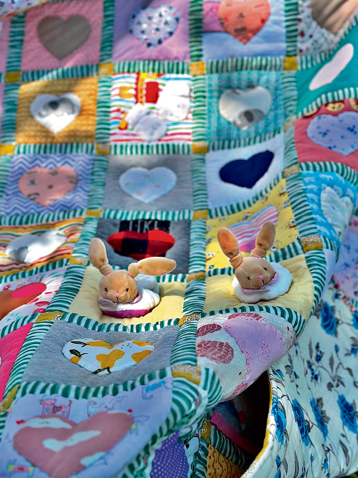 A memory quilt made for a teen, using their toddler clothes. A memory quilt made for a teen, using their toddler clothes.