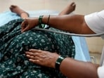 A senior nurse uses a stethoscope to examine a 25-year-old who is nine months pregnant, at a government maternity hospital which runs on rooftop solar power, in Raichur. A senior nurse uses a stethoscope to examine a 25-year-old who is nine months pregnant, at a government maternity hospital which runs on rooftop solar power, in Raichur.