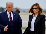 Donald Trump walks with Melania Trump. Donald Trump walks with Melania Trump.