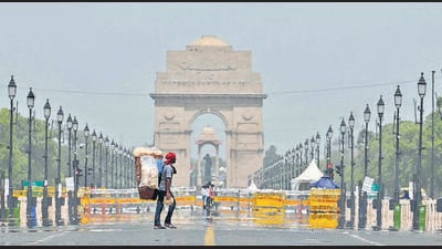 A mirage on a hot and humid day, at Kartavya Path in New Delhi on Sunday. (Vipin Kumar/HT Photoimes) A mirage on a hot and humid day, at Kartavya Path in New Delhi on Sunday. (Vipin Kumar/HT Photoimes)