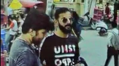 A videograb of the two suspects buying the knives. (HT Photo)