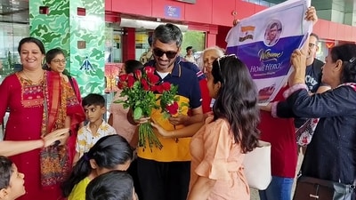 Vadodara, June 11 (ANI): Harshvardhan Savche, one of the Indian sailors detained in Navy of Equatorial Guinea and later in Nigeria, being welcomed by his family and friends on his arrival at an airport in Vadodara on Sunday. (ANI Photo) (ANI) Vadodara, June 11 (ANI): Harshvardhan Savche, one of the Indian sailors detained in Navy of Equatorial Guinea and later in Nigeria, being welcomed by his family and friends on his arrival at an airport in Vadodara on Sunday. (ANI Photo) (ANI)