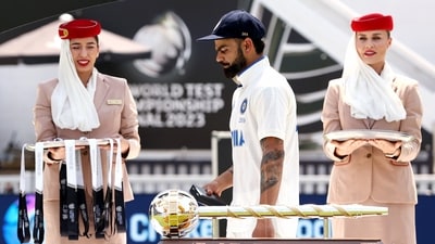 India's Virat Kohli passes through the winner's mace during the presentation ceremony (ICC Twitter) India's Virat Kohli passes through the winner's mace during the presentation ceremony (ICC Twitter)