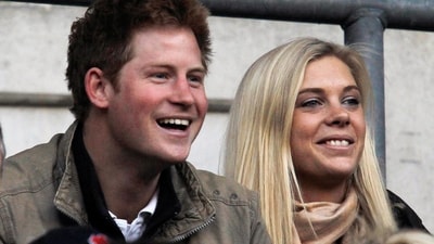 Britain's Prince Harry and Chelsy Davy attend the friendly international rugby union match between England and Australia at Twickenham in London on November 7, 2009. (File)