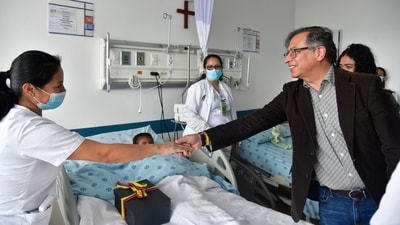 Colombia's President Gustavo Petro greets a nurse tending to one of the four Indigenous children who survived an Amazon plane crash that killed three adults and then braved the jungle for 40 days before being found alive, at a military hospital in Bogota, Colombia, Saturday, June 10, 2023. (Colombia's Press Office via AP) (AP) Colombia's President Gustavo Petro greets a nurse tending to one of the four Indigenous children who survived an Amazon plane crash that killed three adults and then braved the jungle for 40 days before being found alive, at a military hospital in Bogota, Colombia, Saturday, June 10, 2023. (Colombia's Press Office via AP) (AP)