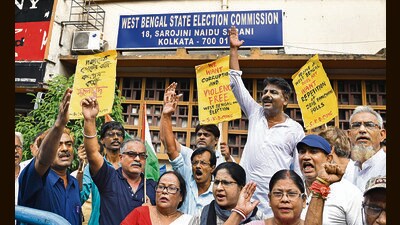 Congress supporters raise slogans during a protest in front of West Bengal State Election Commission office against the alleged killing of their party's worker in Murshidabad district ahead of Panchayat polls, in Kolkata. (PTI) Congress supporters raise slogans during a protest in front of West Bengal State Election Commission office against the alleged killing of their party's worker in Murshidabad district ahead of Panchayat polls, in Kolkata. (PTI)