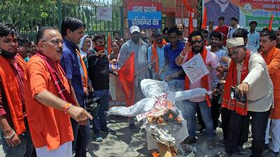 Members of Bhairav Sena Sangathan burn an effigy during a protest in Uttarakhand, in Dehradun on Sunday. (ANI Photo) (ANI) Members of Bhairav Sena Sangathan burn an effigy during a protest in Uttarakhand, in Dehradun on Sunday. (ANI Photo) (ANI)