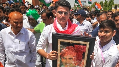 Congress leader Sachin Pilot with a young supporter during his 'Jan Sangharsh Yatra' in Jaipur on May 15. (PTI) Congress leader Sachin Pilot with a young supporter during his 'Jan Sangharsh Yatra' in Jaipur on May 15. (PTI)