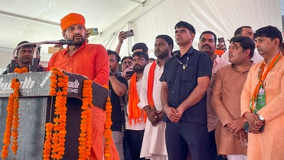 BJP MP Brij Bhushan Sharan Singh addresses a programme marking the completion of 9 years of BJP-led central government, in Gonda, Sunday, June 11. (PTI)