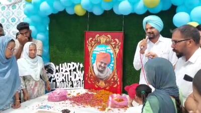 Sidhu Moose Wala’s parents at a function to mark 30th birthday of the slain singer, at Moosa village in Mansa on Sunday. (HT File) Sidhu Moose Wala’s parents at a function to mark 30th birthday of the slain singer, at Moosa village in Mansa on Sunday. (HT File)