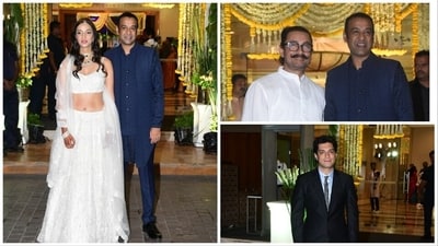 Madhu Mantena and Ira Trivedi reception: Aamir Khan and son Junaid at the venue. Madhu Mantena and Ira Trivedi reception: Aamir Khan and son Junaid at the venue.