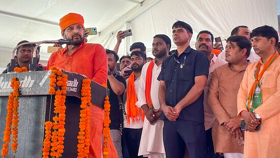 BJP MP Brij Bhushan Sharan Singh addresses a programme marking the completion of 9 years of BJP-led central government, in Gonda, Sunday, June 11. (PTI)