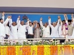 Bihar CM Nitish Kumar (fourth from left) with RJD's Tejaswi Yadav (second from left), Congress president Mallikarjun Kharge, Rahul Gandhi and Priyanka Gandhi at the swearing-in ceremony of the newly-elected Karnataka government headed by Siddaramaiah (fifth from right), last month. 