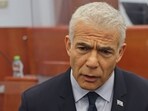 Former Israeli premier and opposition leader Yair Lapid arrives to testify in the corruption trial of Prime Minister Benjamin Netanyahu before Jerusalem's District Court. Former Israeli premier and opposition leader Yair Lapid arrives to testify in the corruption trial of Prime Minister Benjamin Netanyahu before Jerusalem's District Court.