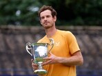Andy Murray celebrates with the trophy after winning the final match against Austria's Jurij Rodionov