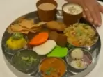The Modi ji Thali comprises dishes as diverse as sarson ka saag and idli. (ANI) The Modi ji Thali comprises dishes as diverse as sarson ka saag and idli. (ANI)