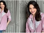 Madhuri Dixit nails the casual look to perfection with a pink kurti and ripped jeans Madhuri Dixit nails the casual look to perfection with a pink kurti and ripped jeans