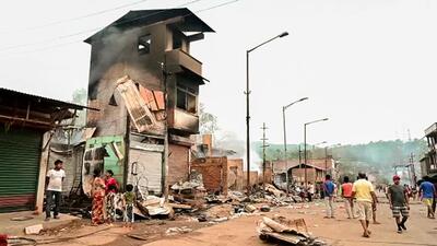 A view of damaged houses and shops seen following fresh violence that occurred in several areas of Manipur on Monday. (ANI)
