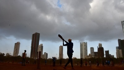 Dark clouds gather over Mumbai's skyline at Shivaji Park, Dadar, in Mumbai. (Photo by Bhushan Koyande) Dark clouds gather over Mumbai's skyline at Shivaji Park, Dadar, in Mumbai. (Photo by Bhushan Koyande)