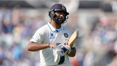 India's Rohit Sharma reacts after being given out lbw off the bowling of Australia's Nathan Lyon on the fourth day of the ICC World Test Championship Final between India and Australia at The Oval cricket ground in London, Saturday, June 10, 2023. (AP Photo/Kirsty Wigglesworth) (AP) India's Rohit Sharma reacts after being given out lbw off the bowling of Australia's Nathan Lyon on the fourth day of the ICC World Test Championship Final between India and Australia at The Oval cricket ground in London, Saturday, June 10, 2023. (AP Photo/Kirsty Wigglesworth) (AP)